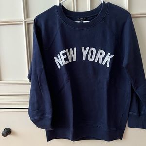 J Crew woman’s crewneck sweatshirt
